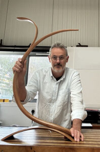 Marc Fish with his sculptural lamp model to be made by students