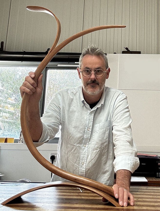 Marc Fish with his sculptural lamp model to be made by students
